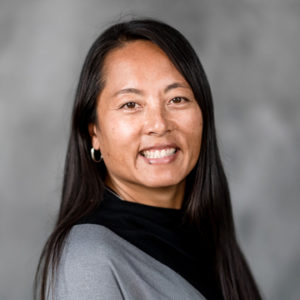 Headshot photo of Nhu Nguyen.