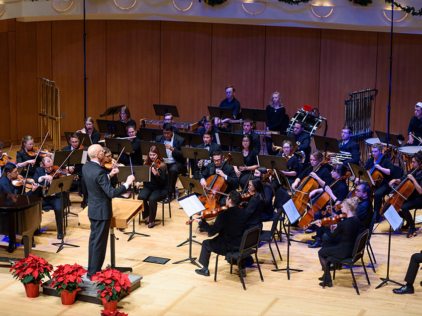 MSU Denver Symphony Orchestra onstage conducted by Brandon Matthews