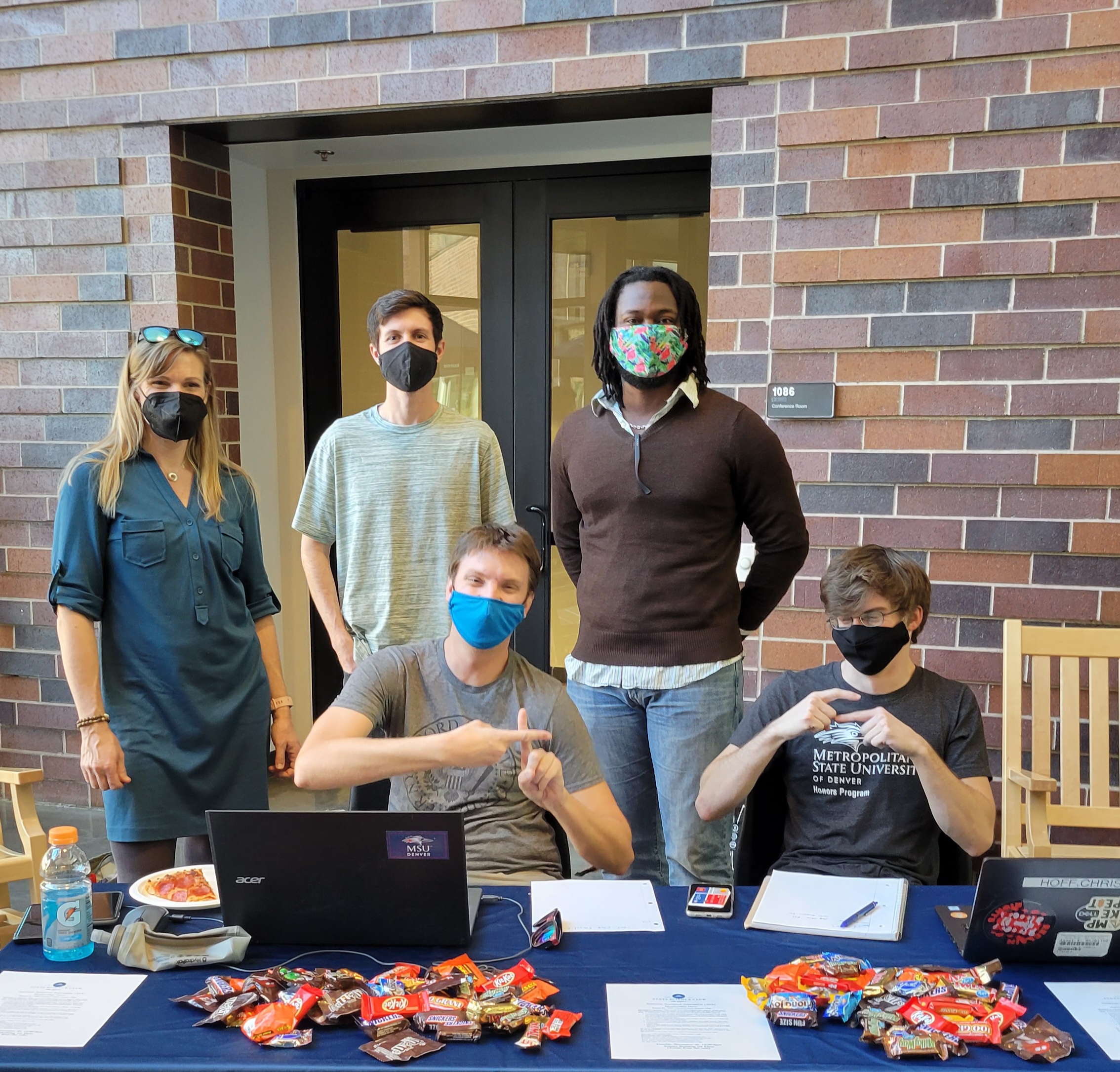 Students at a registration table on campus