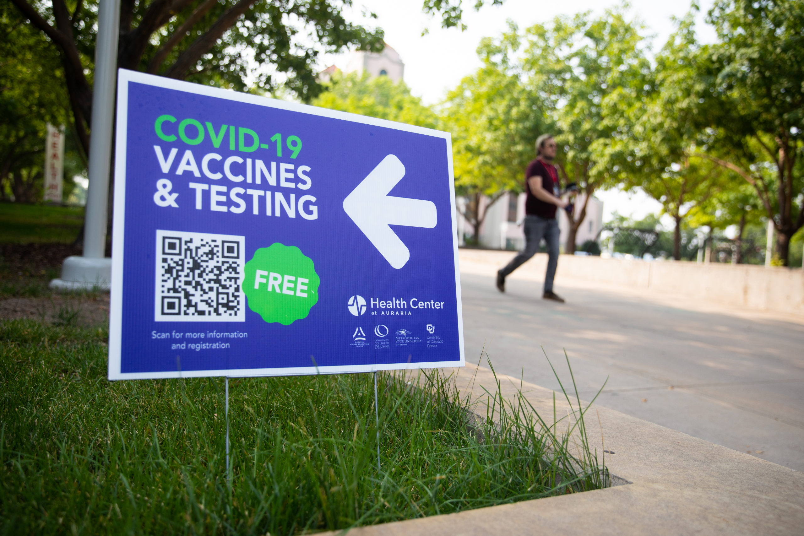 A sign for free COVID-19 vaccines and testing at the Health center at Auraria.