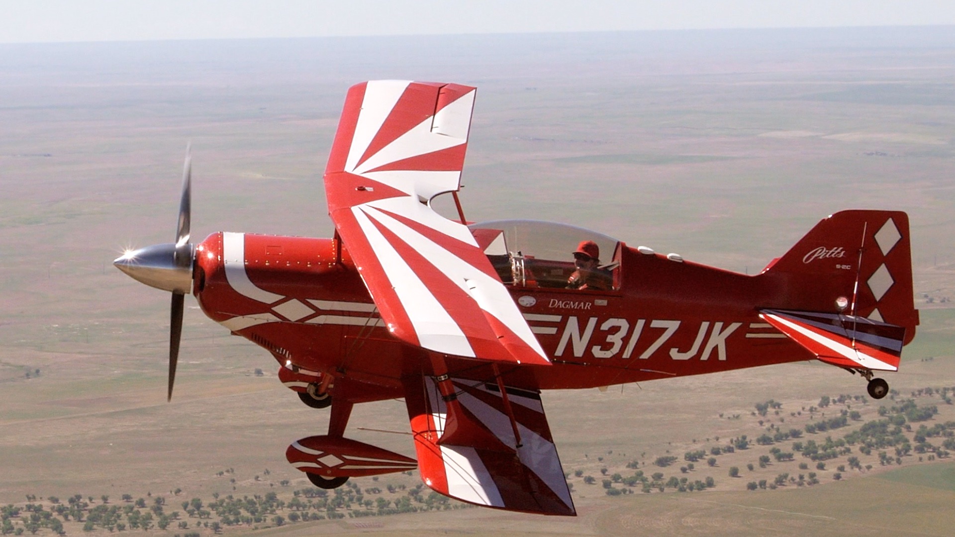 Aerobatics plane soaring.