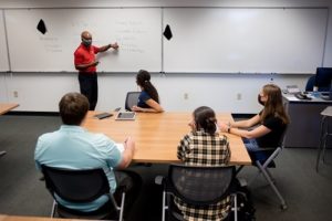 Gregory Clifton teaching a course.