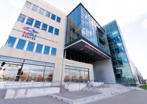 Street shots of the new MSU Denver sign on the Jordan Student Success Building facing the Pepsi Center.