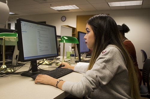 Student working on a desktop computer.