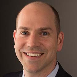 Headshot of Dr. Bryce Pasko, 2021 Outstanding Alumni award winner.
