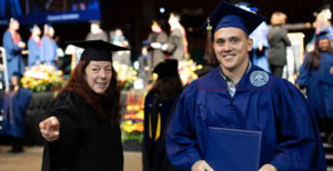 MSU Denver employee and graduate at Commencement.