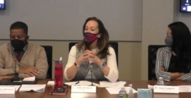 Edward Brown, President Janine Davidson, Ph.D. and Katia Campbell, Ph.D., sitting next to each other while wearing masks.