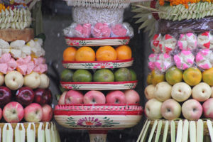 tower of orange green and pink fruits