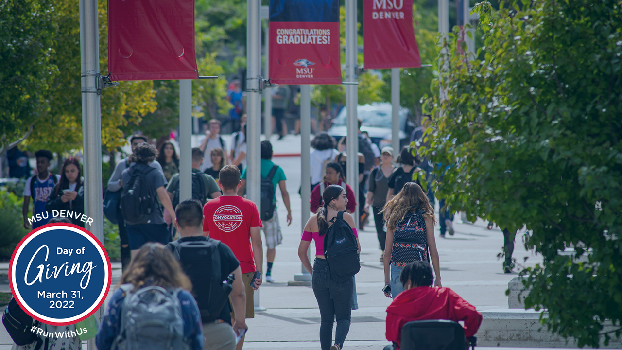 zoom background with students walking through campus between st. cajetan's and the king center
