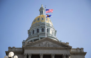 Colorado State Capitol with the American and Colorado flags flying