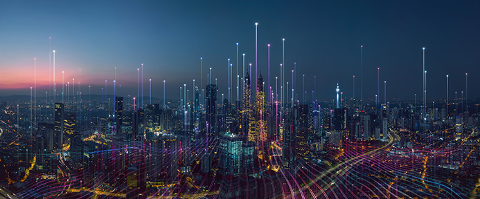 Cityscape with beams of light to evoke a digital, smart city en español: Paisaje urbano con haces de luz para evocar una ciudad digital e inteligente