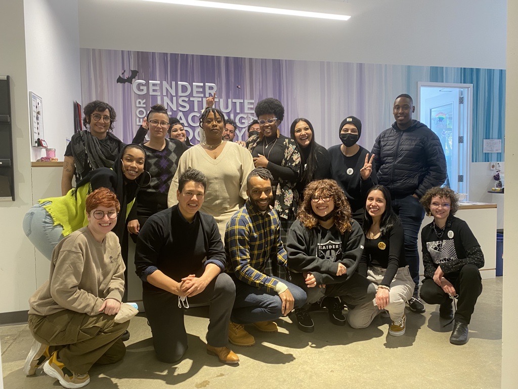 Group photo of Patrisse Cullors and GITA faculty, friends, and staff.