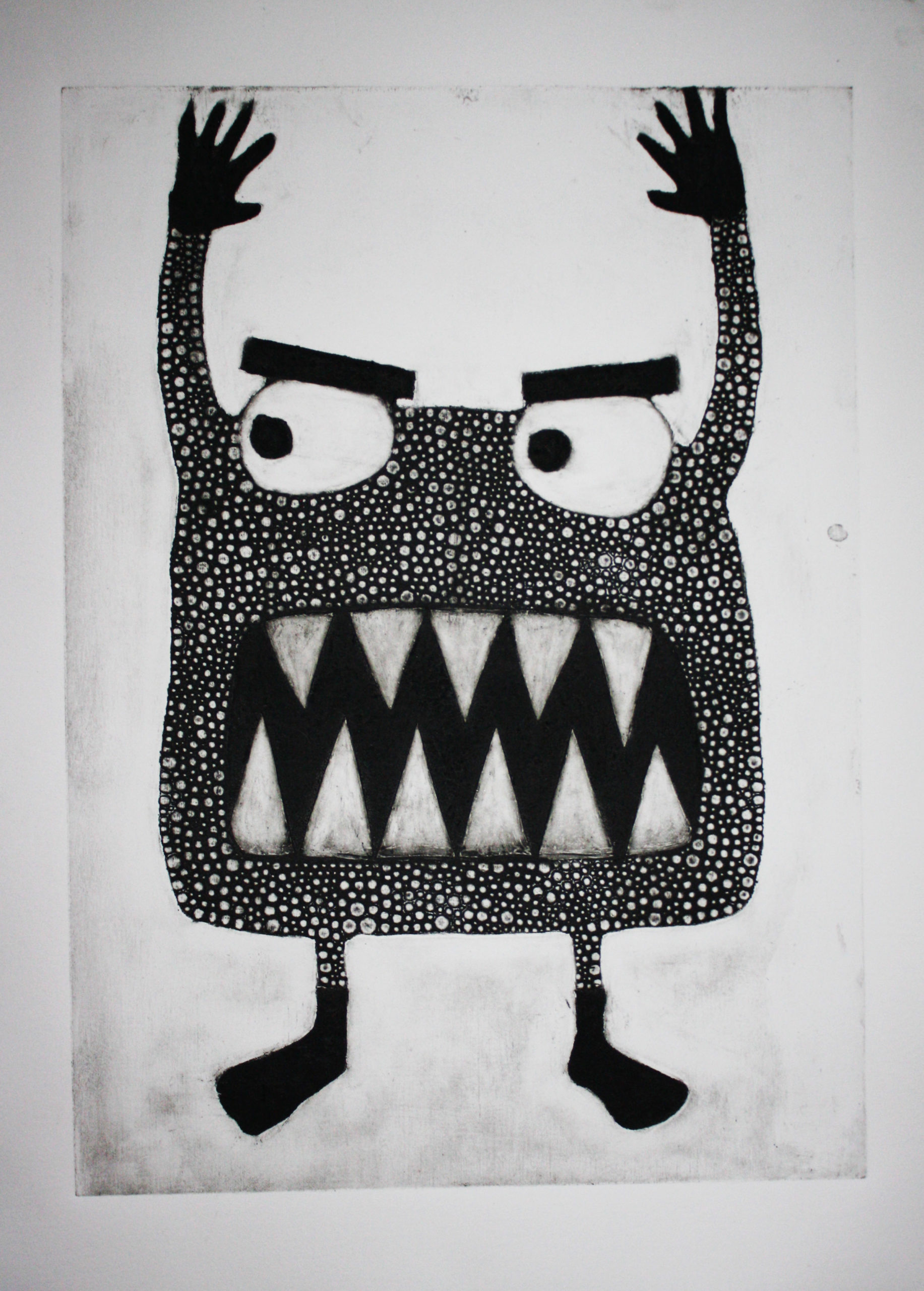 A stylized monster with dotted body pattern, large eyes, and sharp teeth raises its arms.