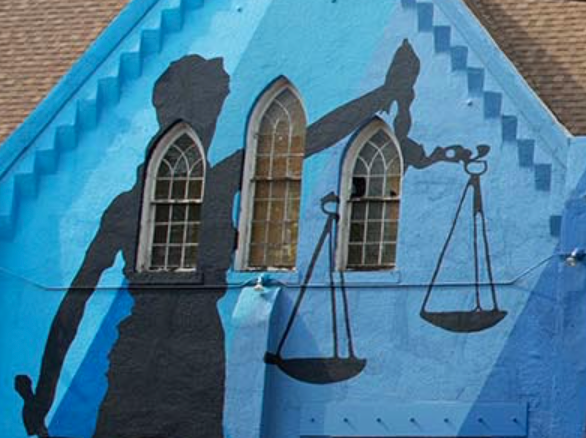 Mural depicting scales of justice