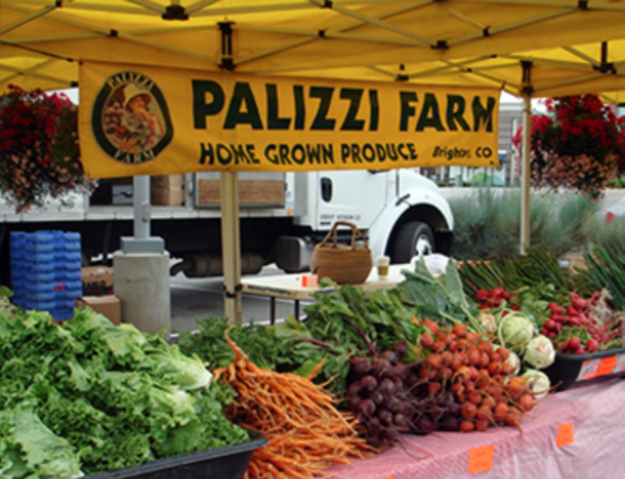 photo of the Palizzi Farm booth at a farmers market