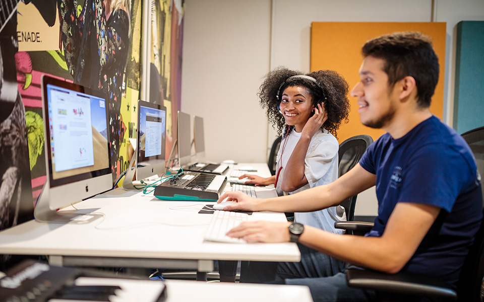 Online Learning Students at desk workspace