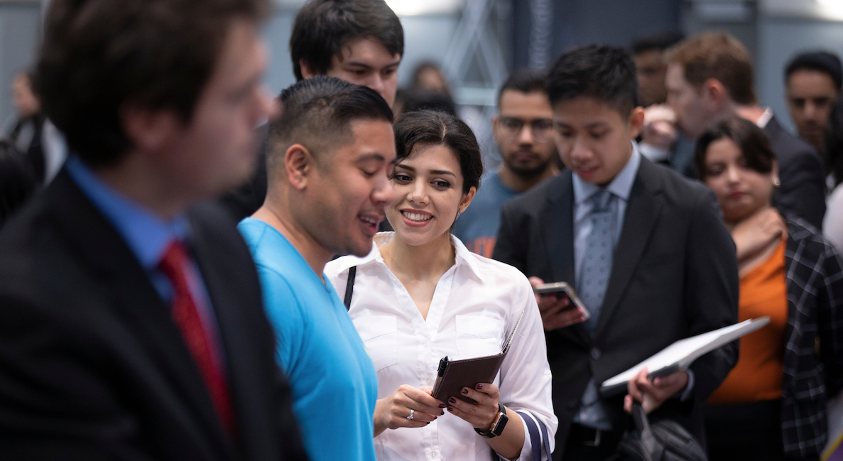 Large group of people at a job fair