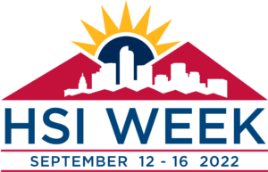 Logo celebrating HSI Week. There is a blue sun, yellow sun rays, a city in white in front of mountains in red .