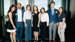 Janine Davidson, Ph.D., posed with the first six students interning in public service at Mi Vida Restaurant in Washington, DC.