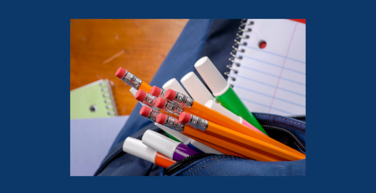 Pencils sticking out of a backpack.