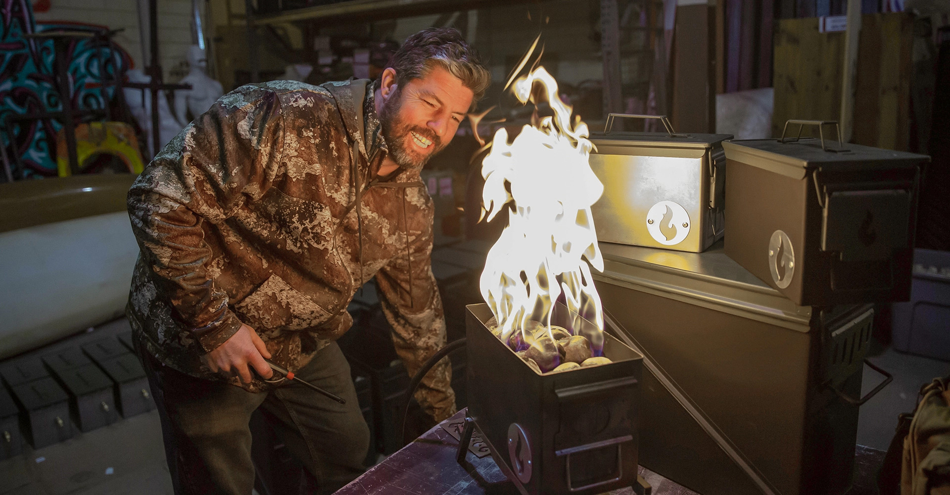 MSU Denver alumnus Josh Thurmond demonstrates the Lava Box, a portable campfire