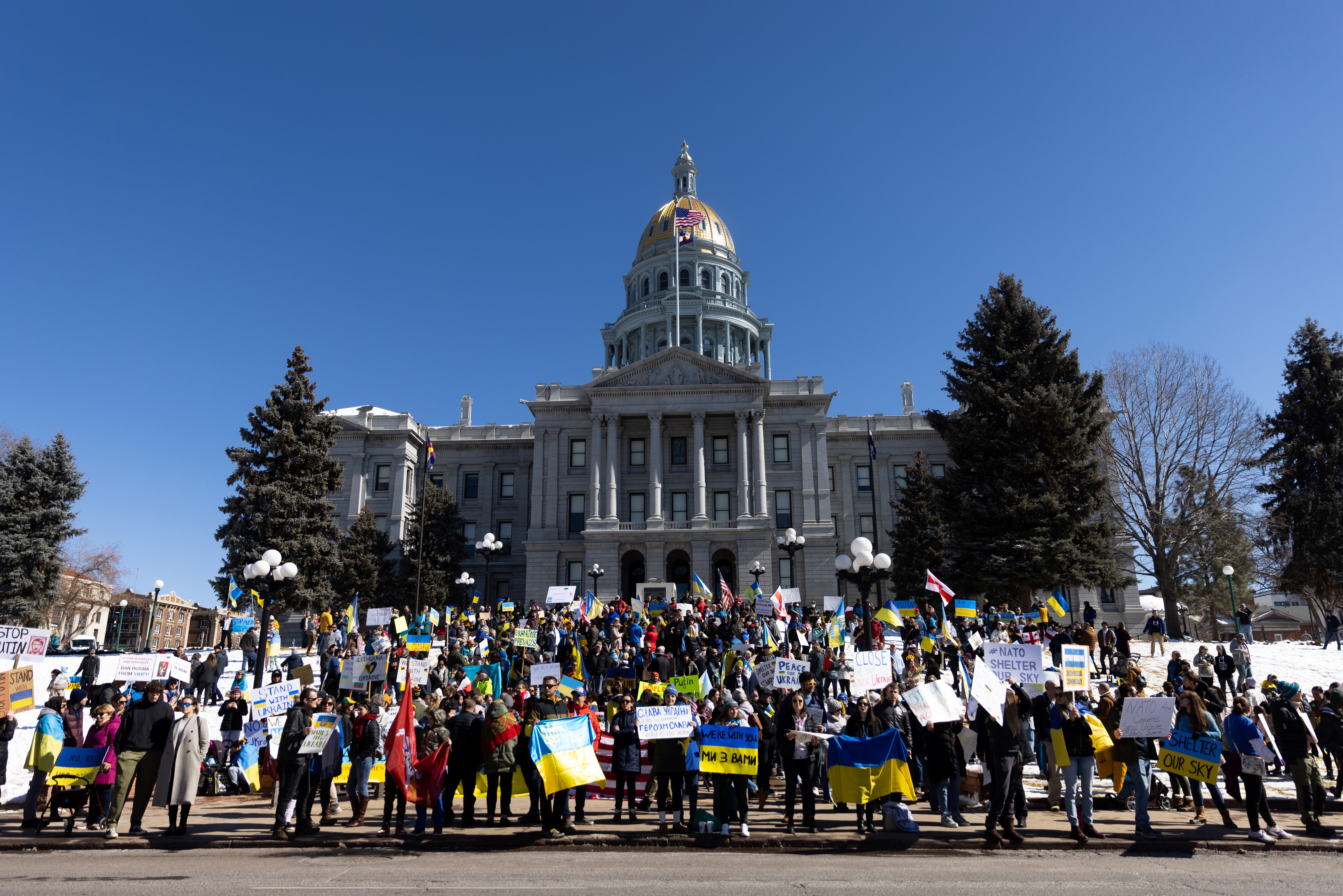 Pro-Ukrainian rallies and protests are happening all across the globe after Russian forces invaded Ukraine. In Denver, hundreds gathered outside the State Capitol to show their support for Ukraine on February 26, 2022. Photo by Alyson McClaran