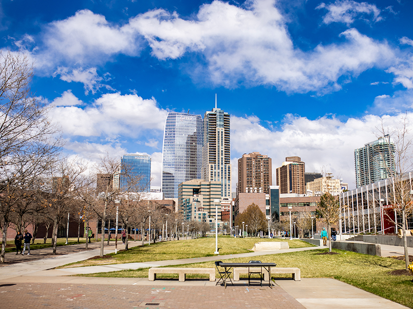 A view of the multi-storied buildings of downtown Denver, taken from outside the Arts Building.