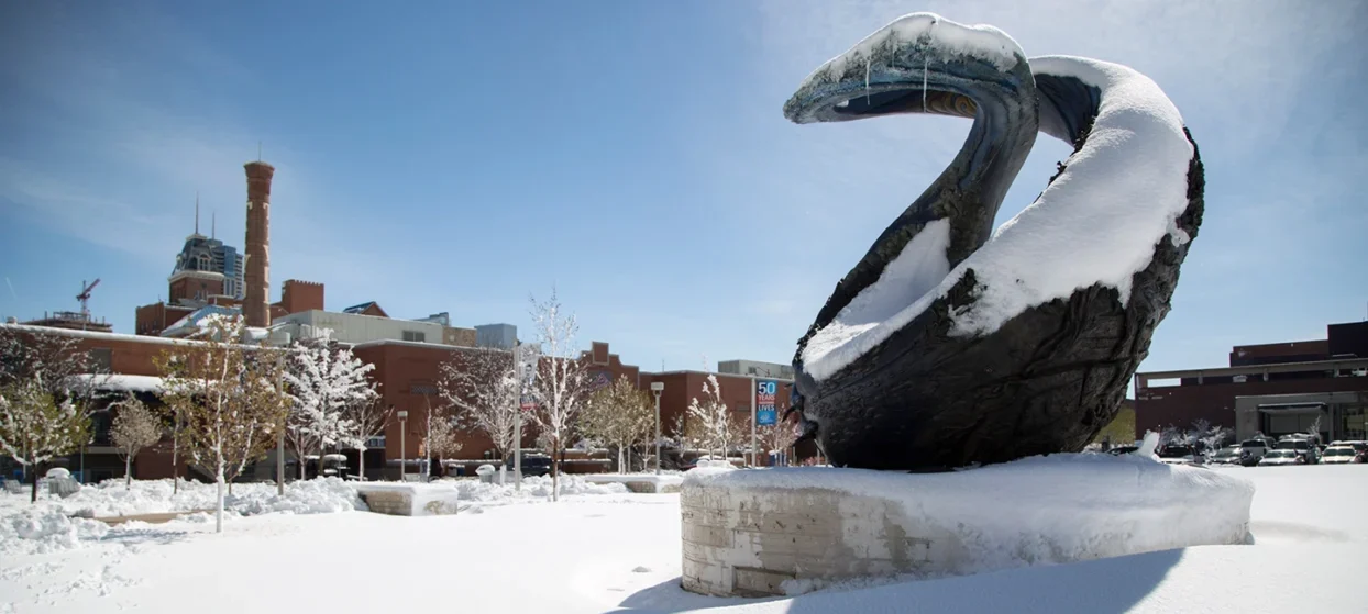 The One World One Water sculpture covered in snow