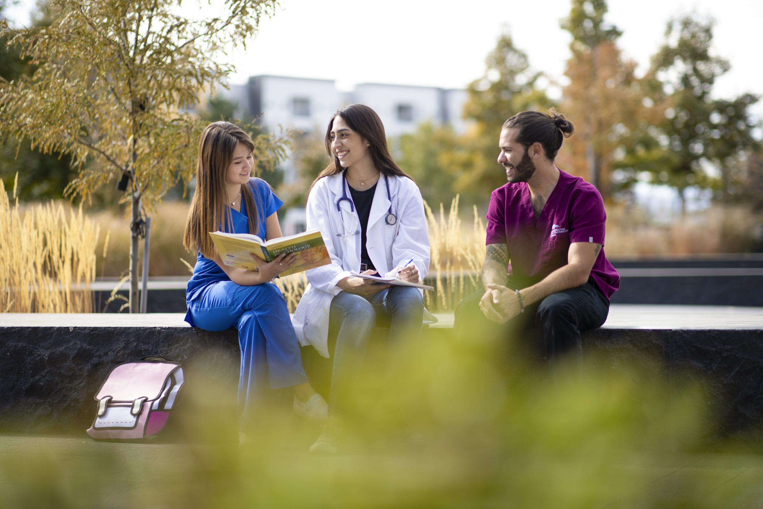 Three healthcare students studying on MSU Denver's campus.