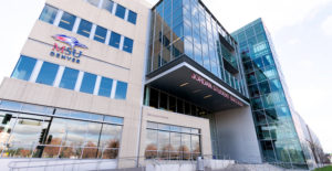 Street shots of the new MSU Denver sign on the Jordan Student Success Building facing Ball Arena.