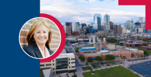 Headshot of Camille Torres, J.D., over an aerial photo of Auraria campus with the Denver skyline in the background.