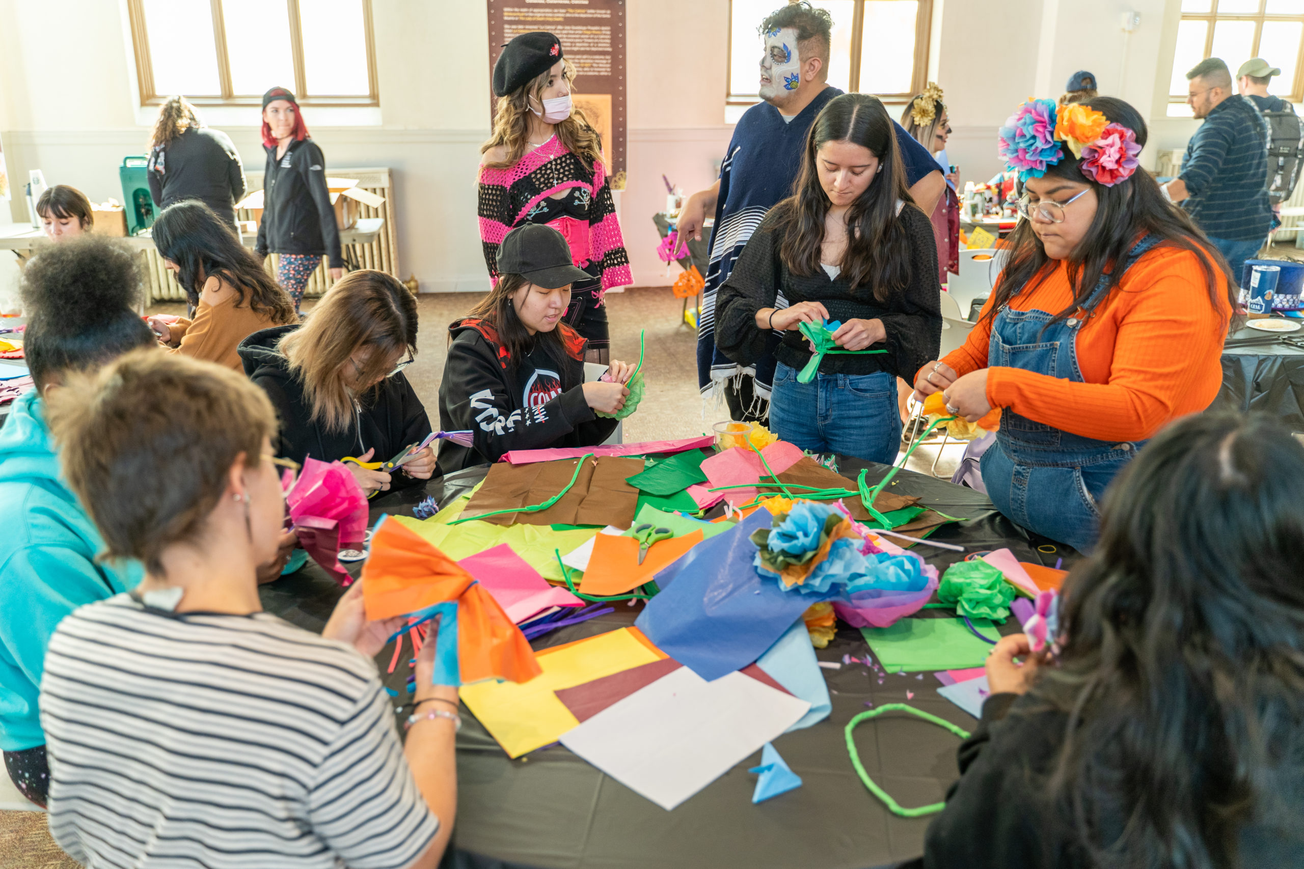 People crafting around a table