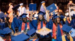 Graduates celebrating at Commencement.