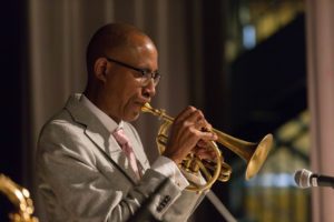 Ron Miles plays the trumpet.