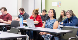 People engaged with a lecture