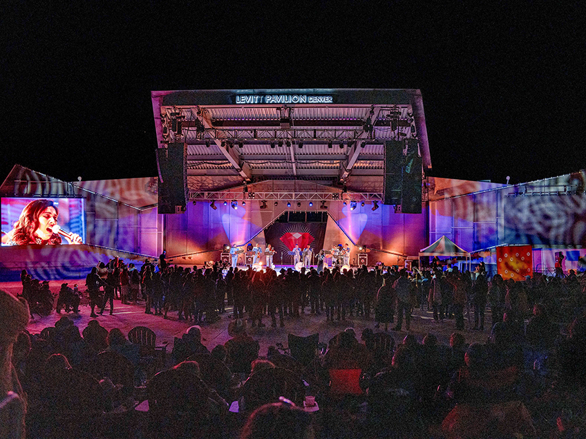 Levitt Pavilion at night with mariachi group on stage