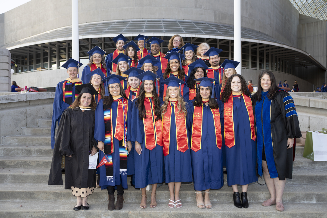 2020-2021 HRSA Scholars in graduation regalia at the 2021 MSW Pinning & Hooding Ceremony