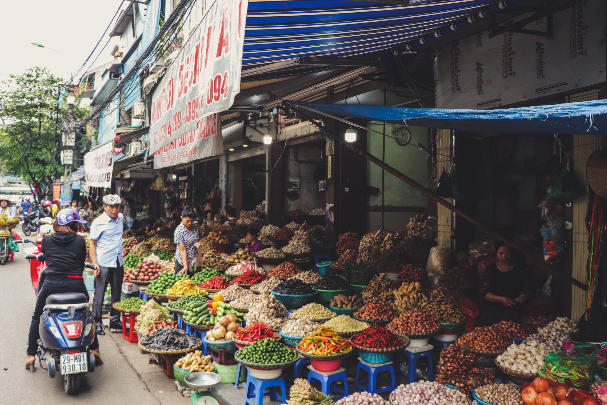 city street in Vietnam with spices and other foods