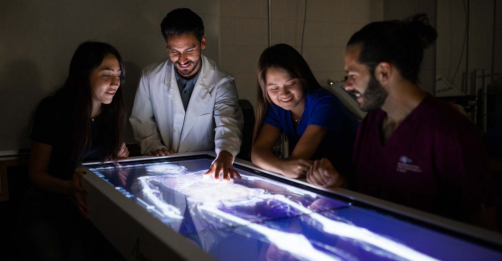 Health students examining an x-ray
