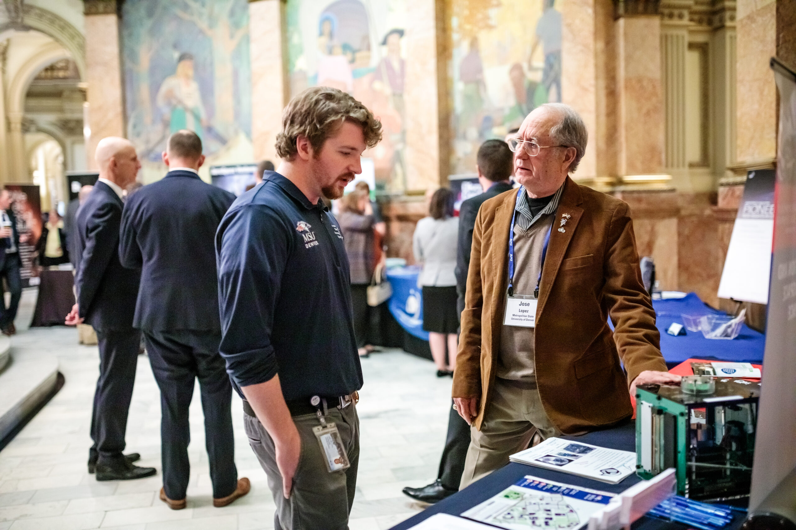 Student and Employer at job fair