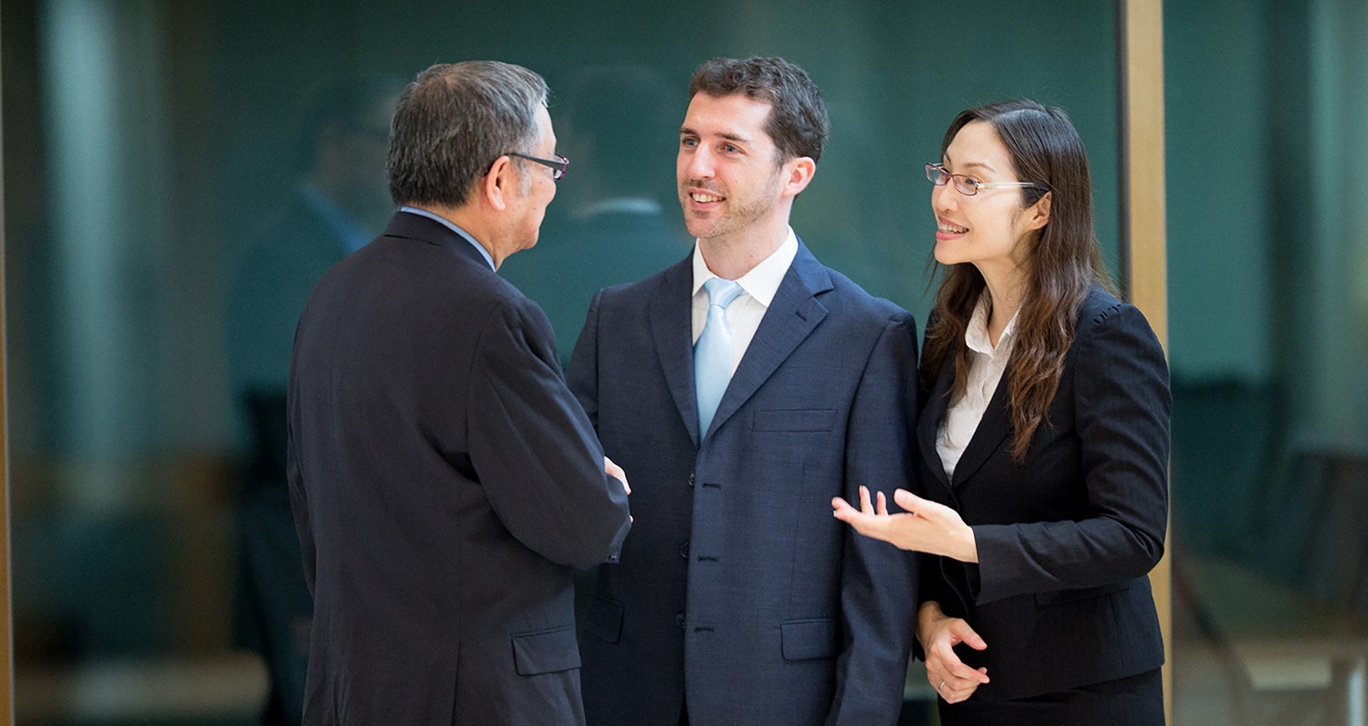 Business people meeting while using an interpreter to assist in communication.