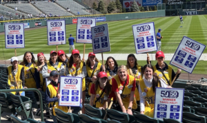 Colorado Rockies 50/50 raffle volunteers at Coors Field