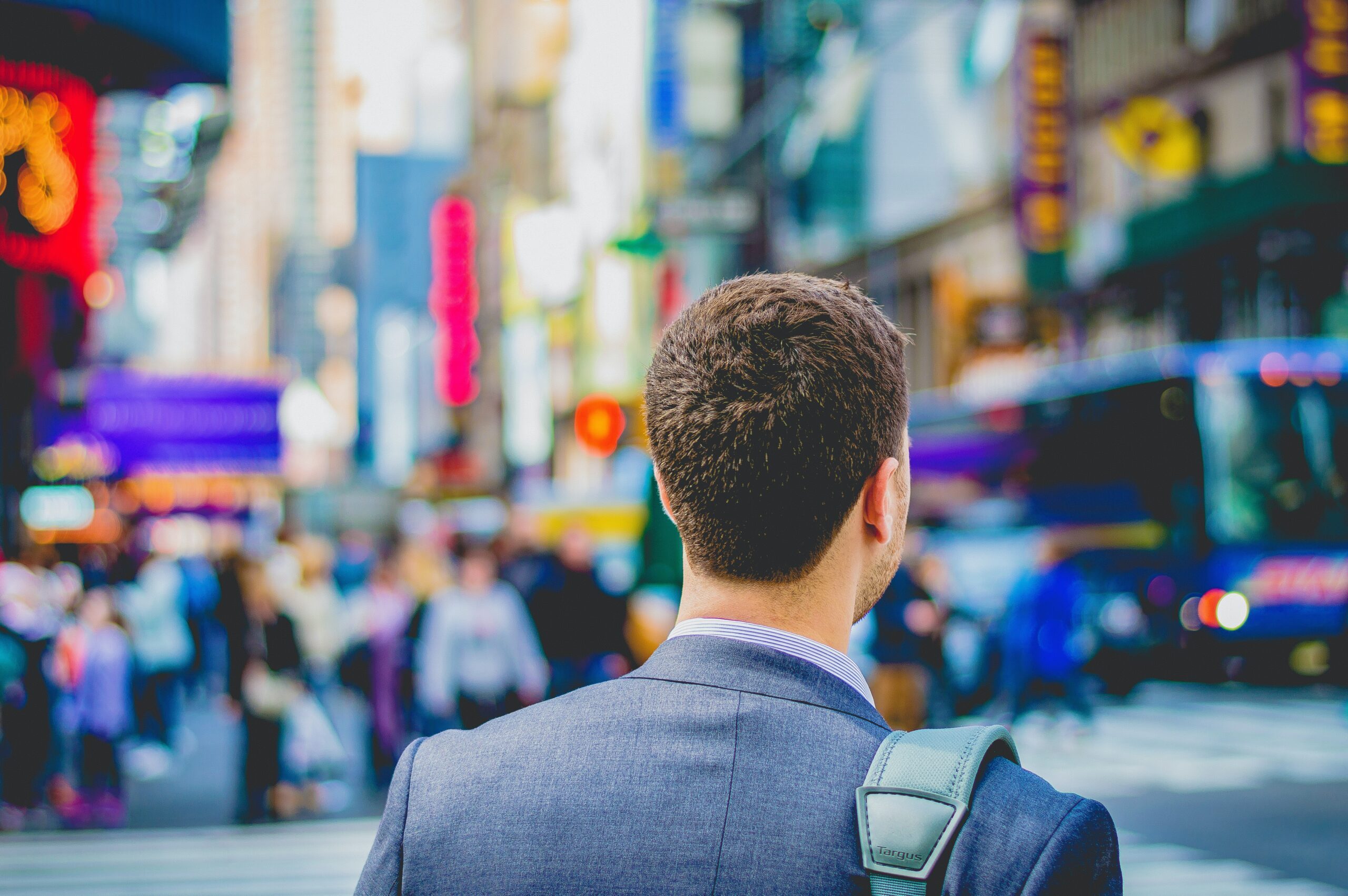 A person facing toward a city scape