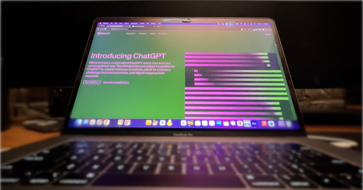 Image of a laptop with an introduction to ChatGBT image on the screen.