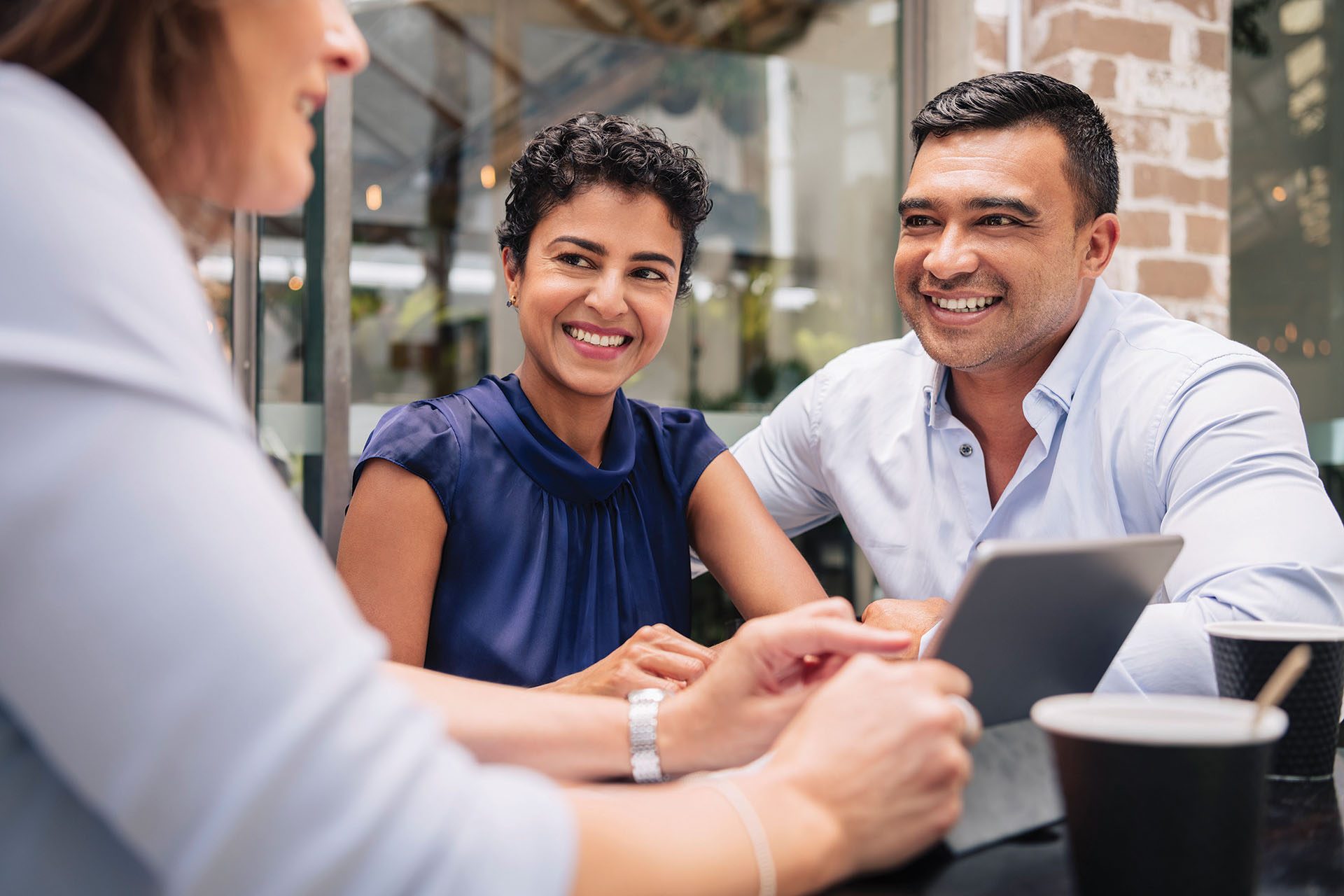 Three people in a conversation