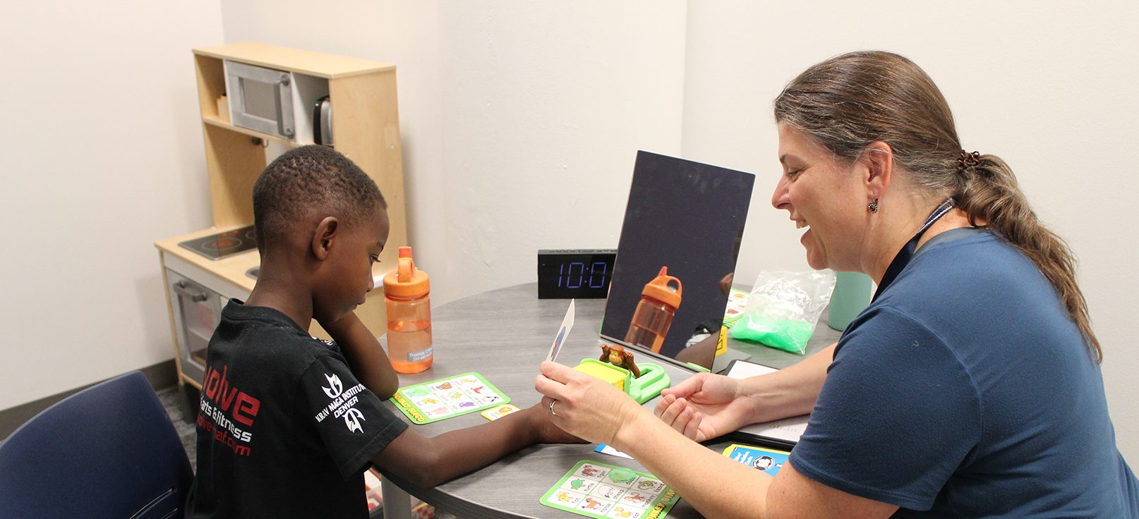 MS SLP graduate student working with a young child in Speech-Language Clinic