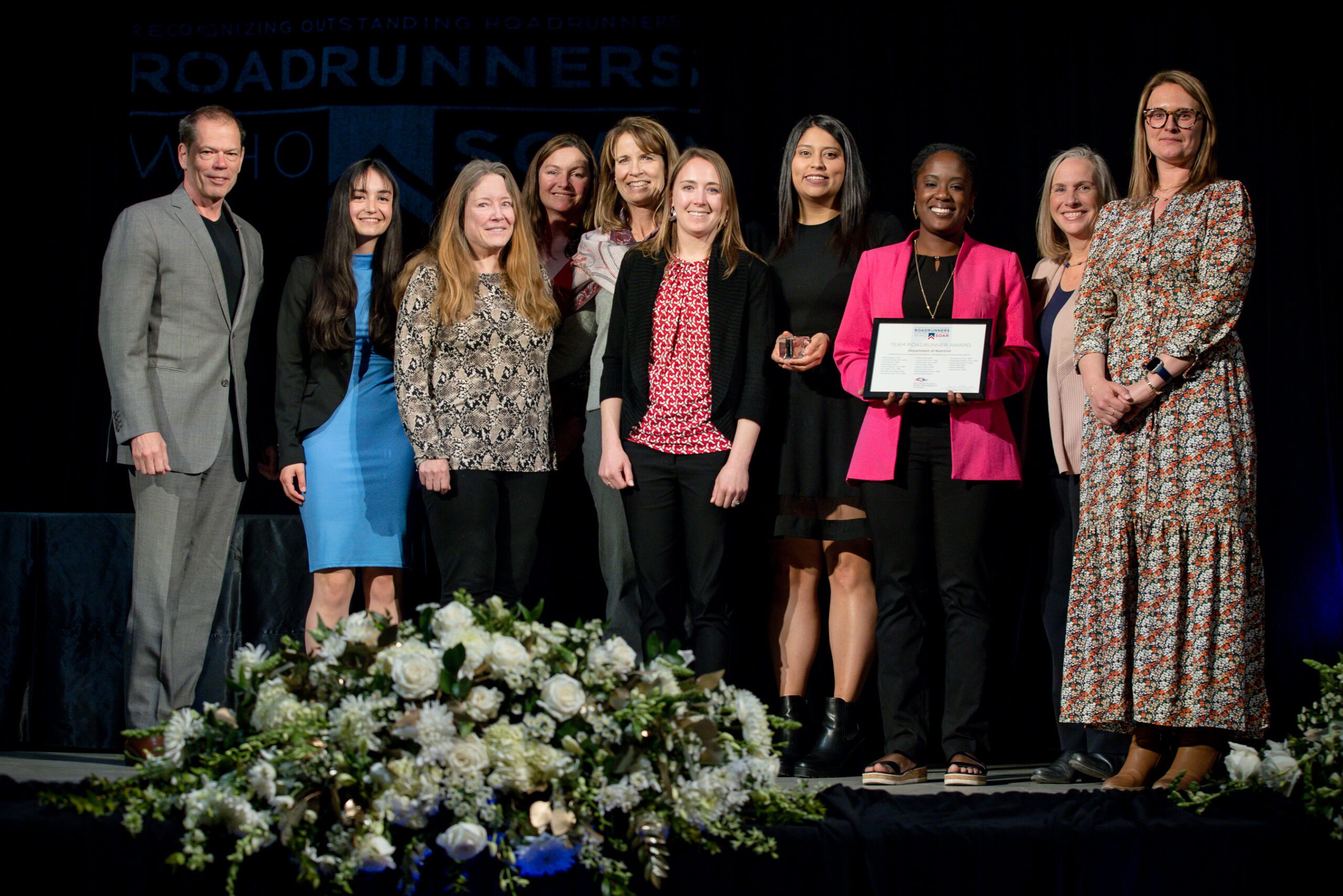 A photo of award recipients at the annual Roadrunners who soar event in the spring of 2023 in the tivoli.