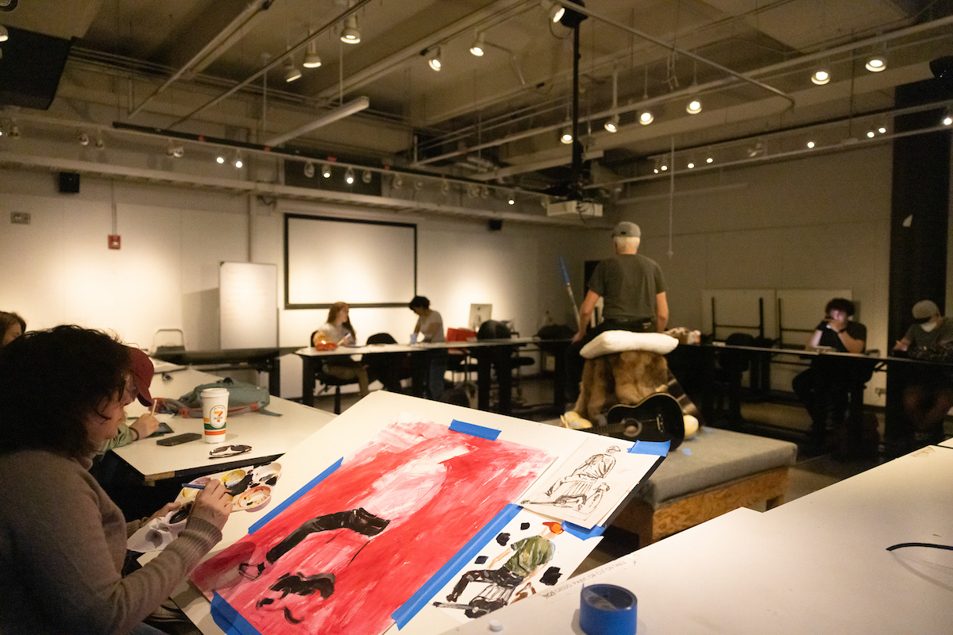 Students work in the studio during the course called 