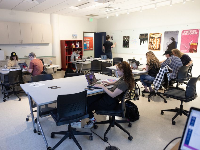 Wide view of the Communication Design Lab for graphic design students.