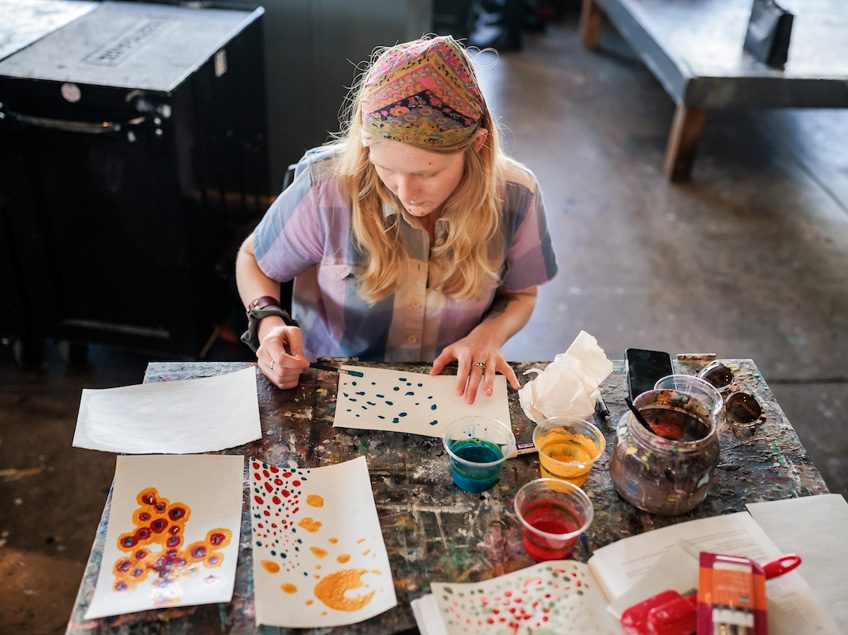 MSU Denver student, Tatum Newman, works on a project in Painting and New Contexts class on May 3, 2023. Photo by Alyson McClaran